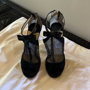 Jimmy Choo black patent/mesh shoes
Size 38
Good condition